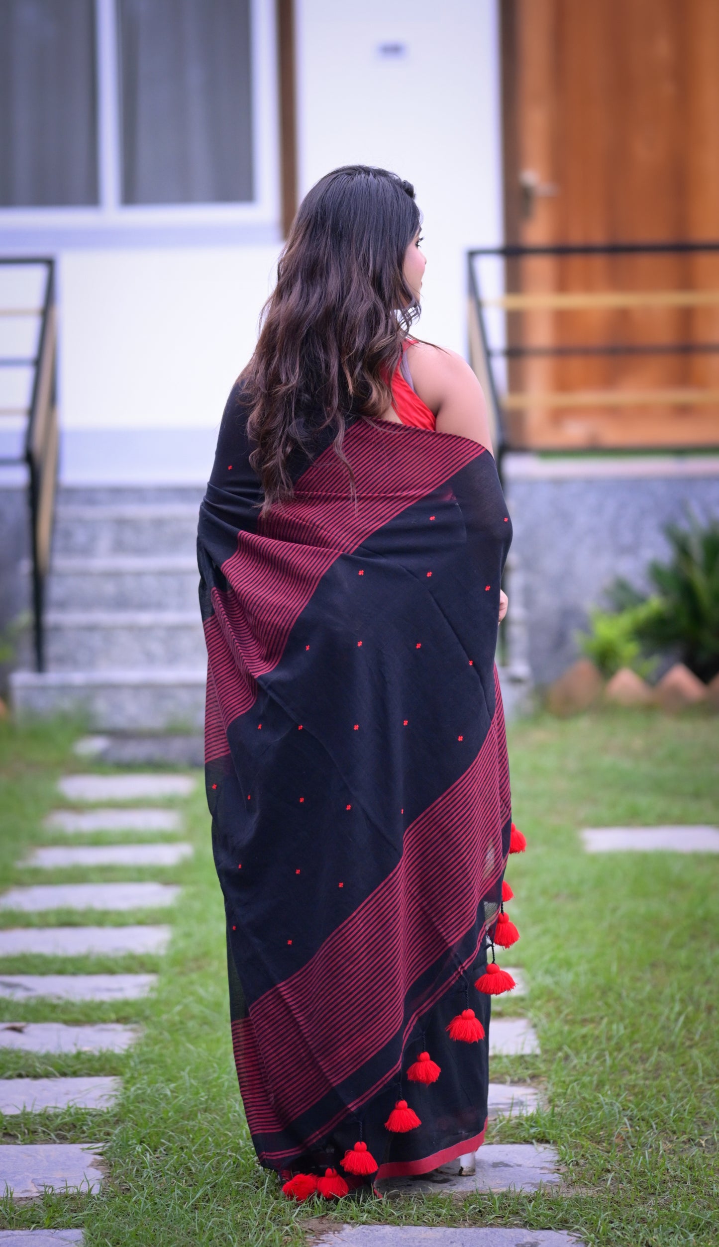 Elegant Black Cotton Saree with Red Detailing and Matching Blouse Piece