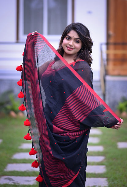 Elegant Black Cotton Saree with Red Detailing and Matching Blouse Piece