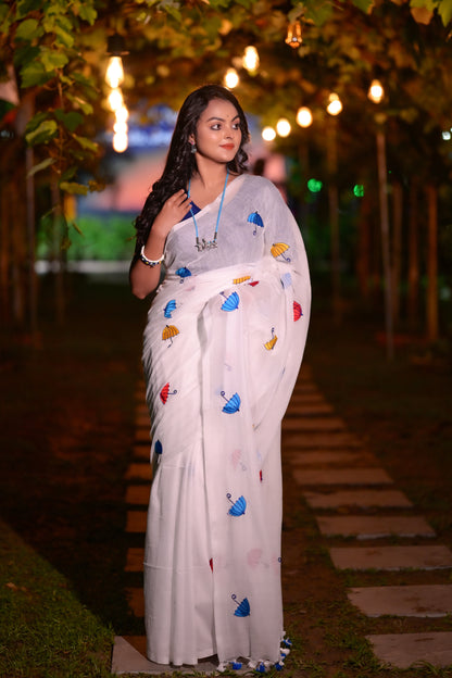 Elegant White Mull Cotton Saree with Colorful Umbrella Embroidery – Handwoven Lightweight Saree