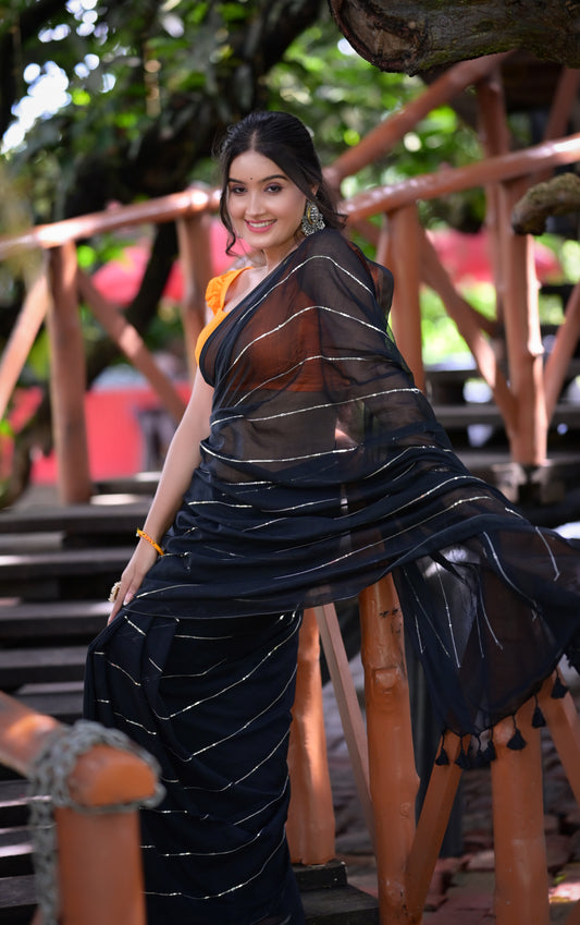Elegant Black Mull Cotton Saree with Silver Stripes & Tassel Pallu – Blouse Not Included