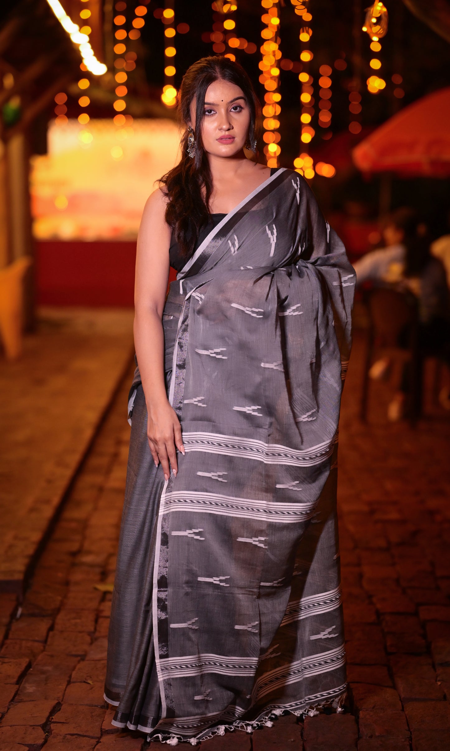 Elegant Handwoven Grey Khadi Cotton Saree with Minimal Ikat Design