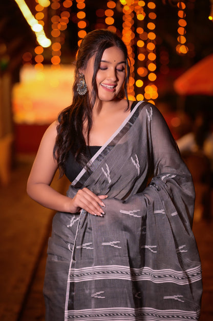 Elegant Handwoven Grey Khadi Cotton Saree with Minimal Ikat Design