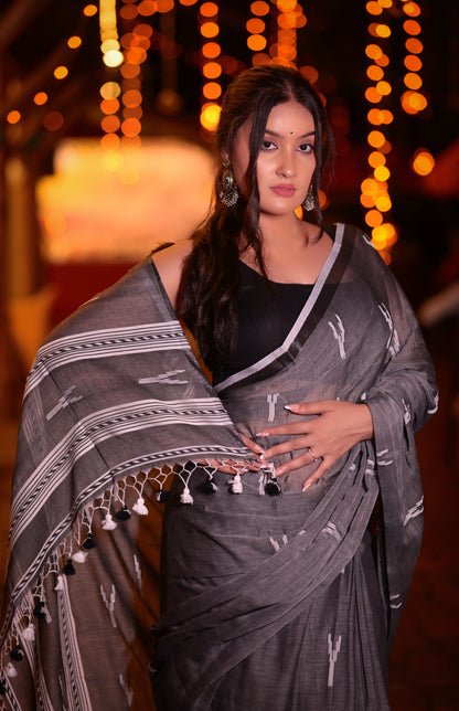 Elegant Handwoven Grey Khadi Cotton Saree with Minimal Ikat Design
