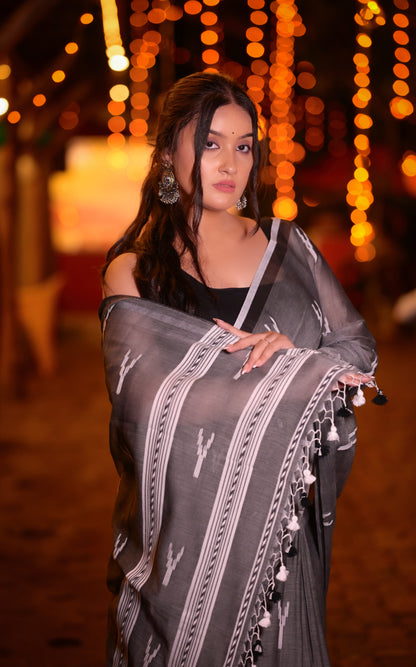 Elegant Handwoven Grey Khadi Cotton Saree with Minimal Ikat Design