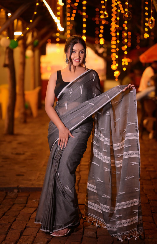 Elegant Handwoven Grey Khadi Cotton Saree with Minimal Ikat Design